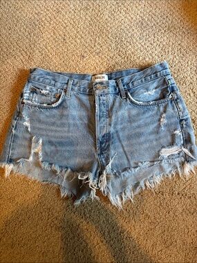 Agolde Light Blue Distressed Denim Cutoff Shorts